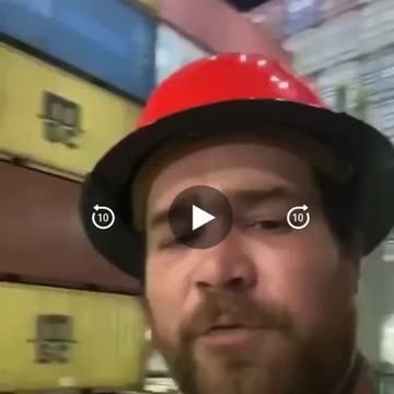 Reuploaded- A short video clip of a worker from a container ship