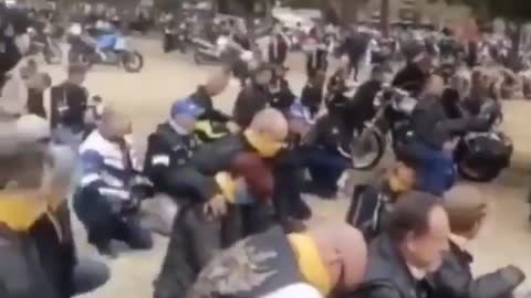 Bikers pray for President Trump