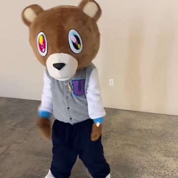 North West rocking Kanye West College Dropout bear mascot suit