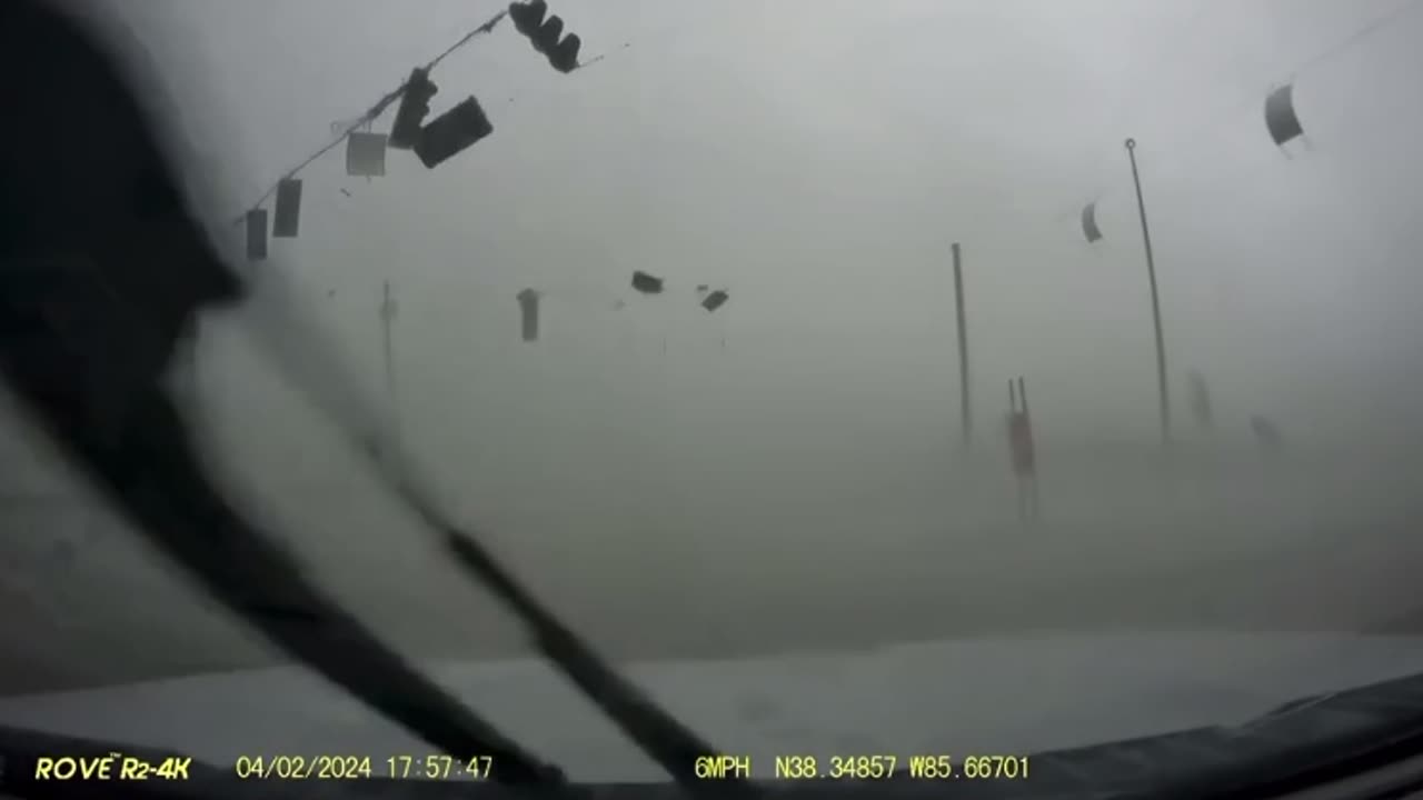 Dashcam captures Indiana motorist's harrowing encounter as tornado flips car over