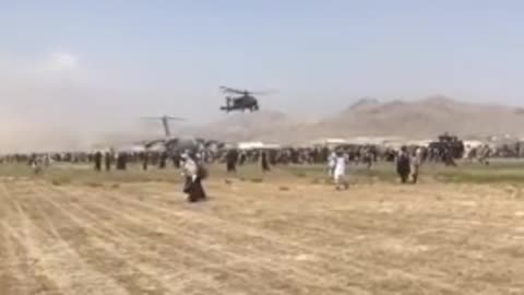 Gut-Wrenching Footage: Afghans Swarm Runway as Helicopters Pull Out