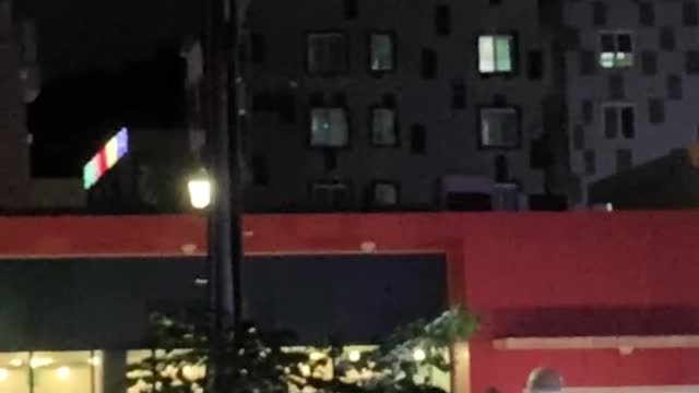 a building turns into a dance light