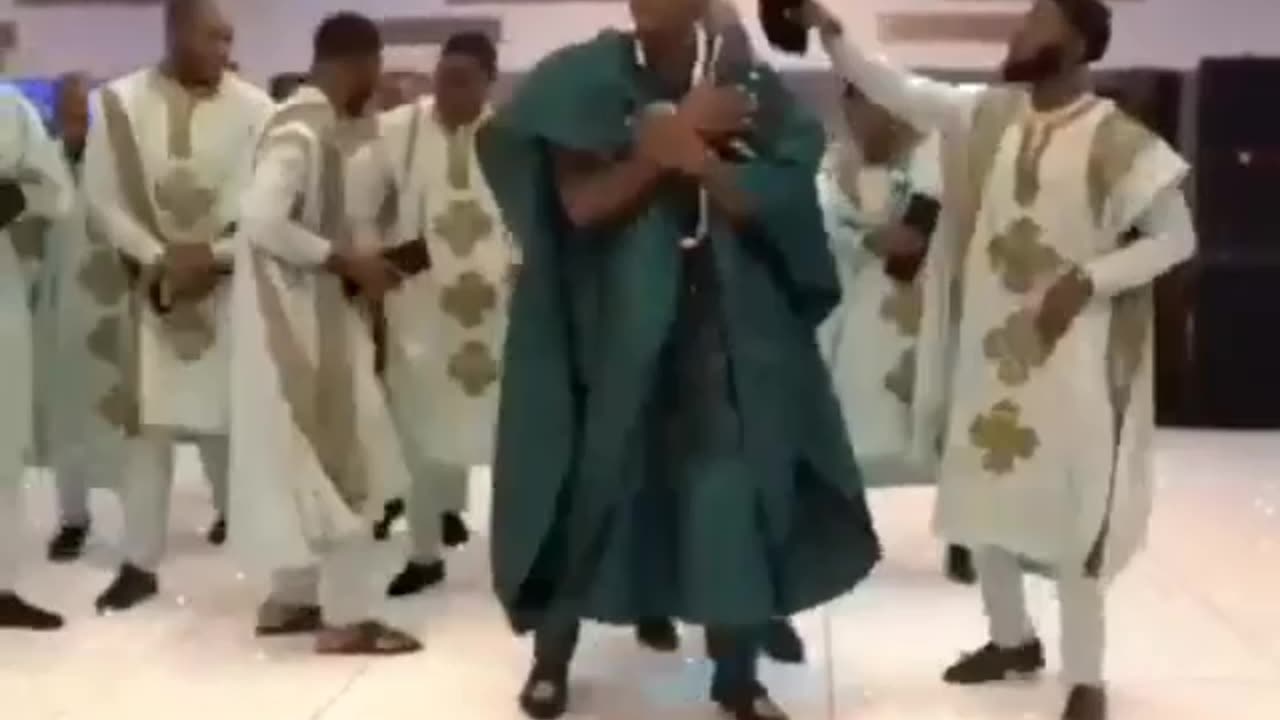 African Groom Dancing At His wedding