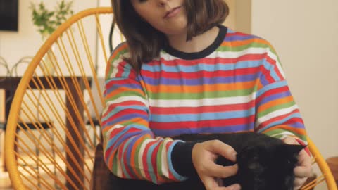 Woman petting a cat