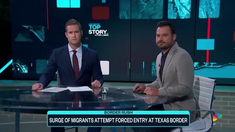 Migrants forcing their way across US border