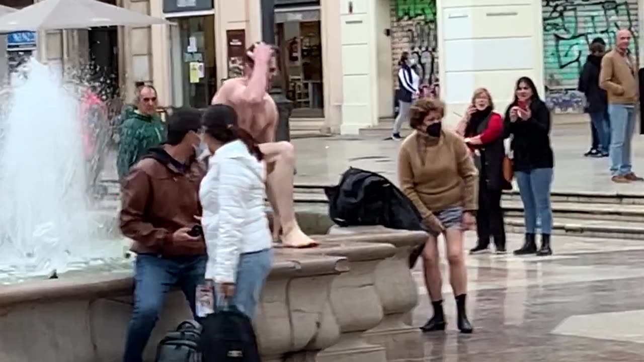 Man Slips After Fountain Dip