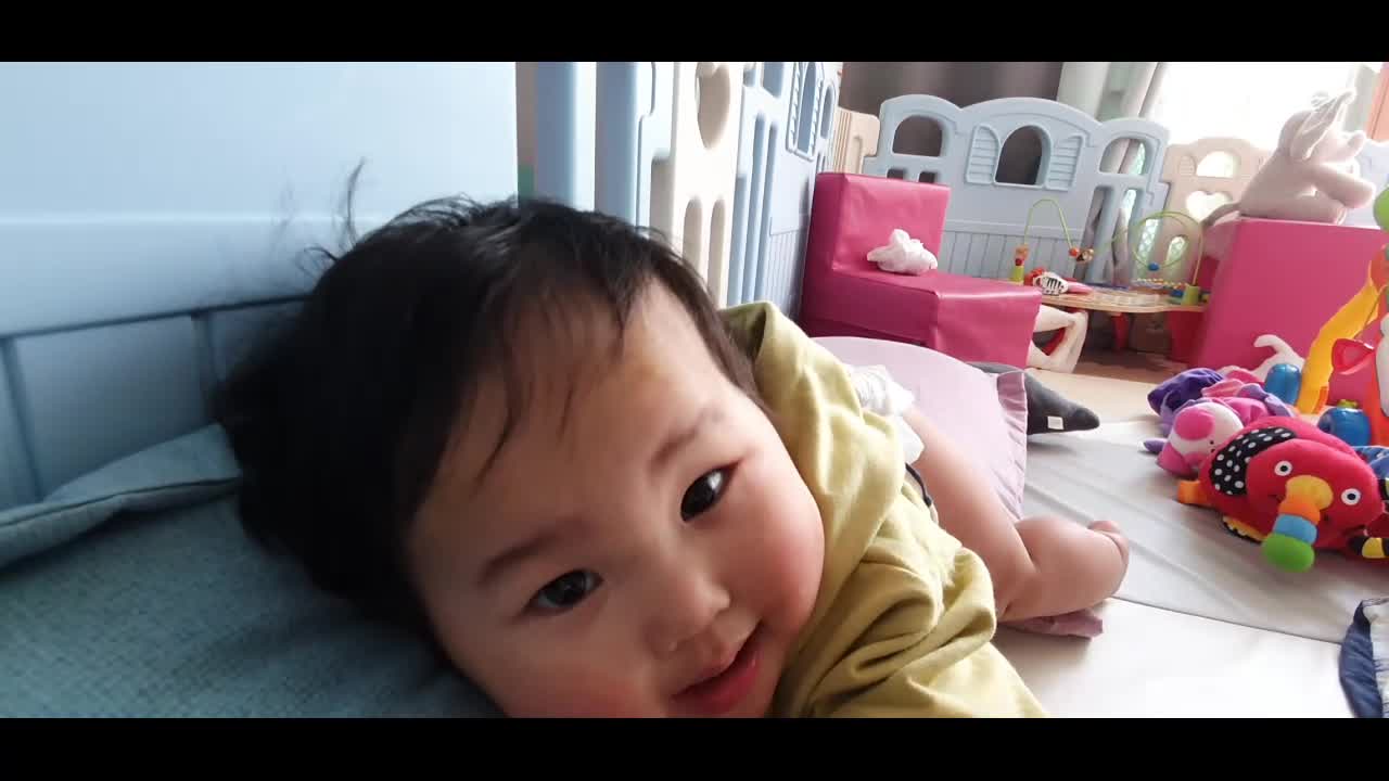 baby drinking milk and whispering
