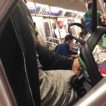 Guy red headphones dancing subway train secret filming