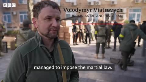 Ukrainian citizen volunteers take up arms to fight Russian invasion