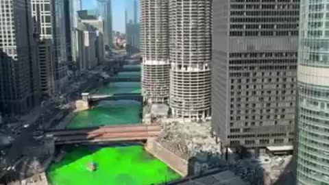 Chicago River colored green in preparation for the annual St. Patrick's Day Parade in the city