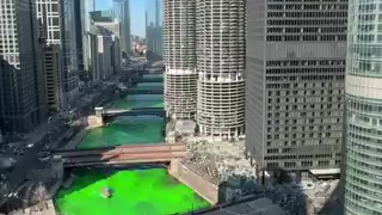 Chicago River colored green in preparation for the annual St. Patrick's Day Parade in the city