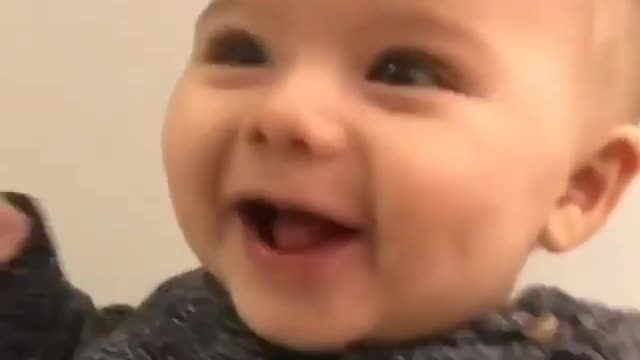 Baby boy laughing