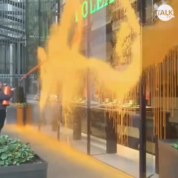 Just Stop Oil activists have sprayed orange paint over high-end jeweller Rolex in Knightsbridge