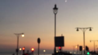 New moon and the sun set in Brighton