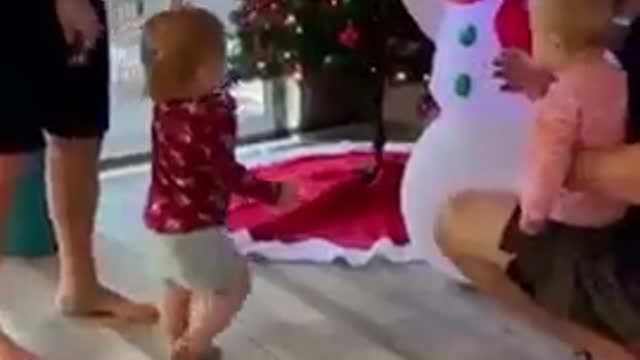 Mom finds quiet toddler eating sugar on kitchen floor