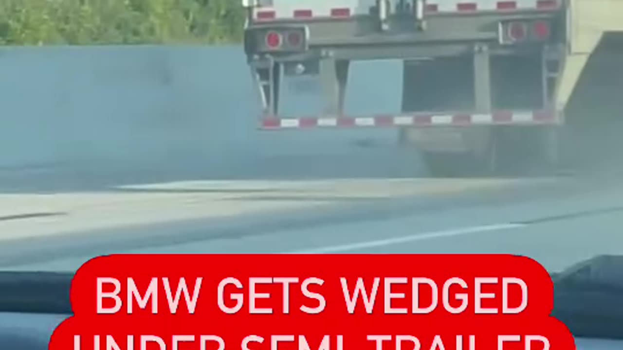 Michigan: A BMW was wedged underneath a semi after a crash on