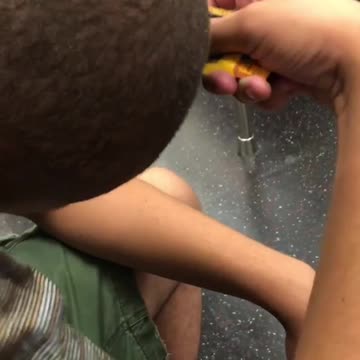 Guy scratching head with yellow credit card train card