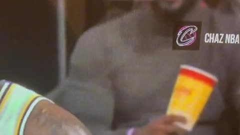 If Lebron James is on the court, who is behind him?
