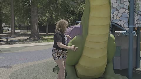 When you must hug the dragon at the castle playground!