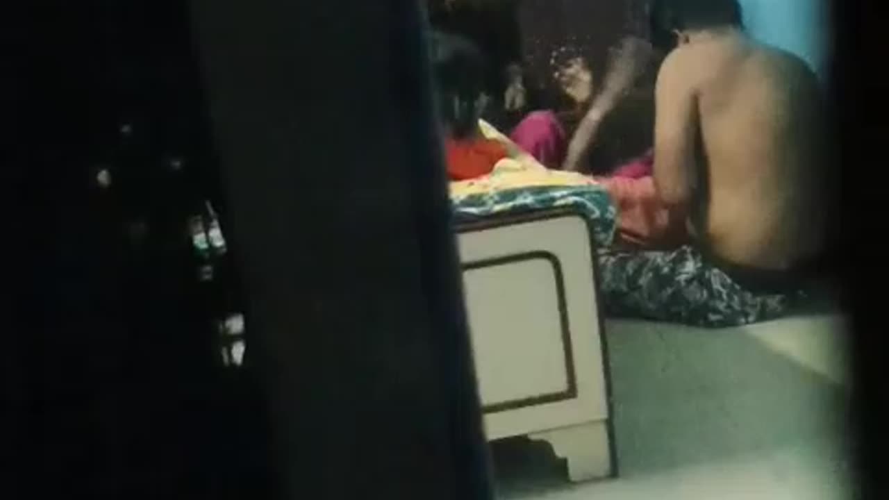 BEATING HIS MOTHER WITH THE HELP OF HIS WIFE