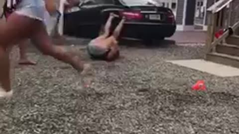 Nsfw woman in germany shirt falls after dizzy bat