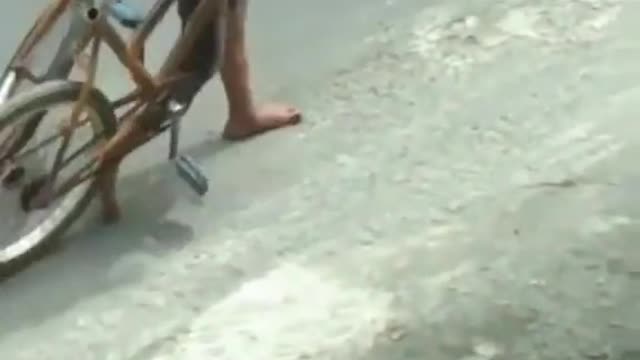 the little boy's bicycle tragedy was torn in two