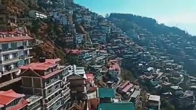 Person_Witnesses_Scenic_Mountains_And_Houses_While_Eating_Breakfast_In_Shimla,_India_ AND GOOD LOOK