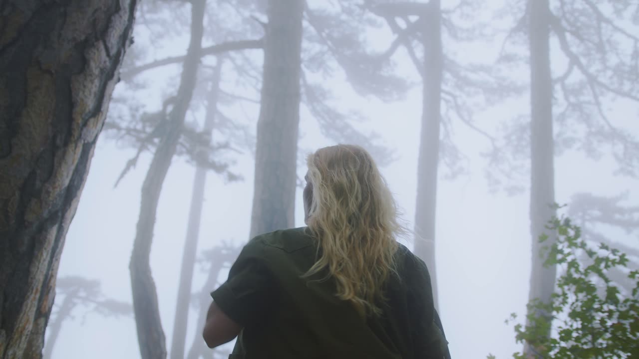 The girl enjoying the beauty of the nature