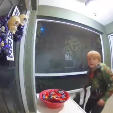 Imagine getting all your candy stolen by a kid dressed as Rex from Fortnite