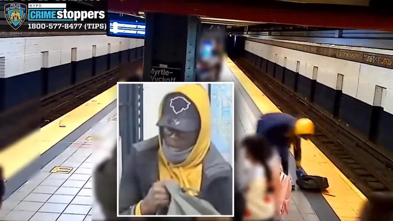 Black guy pushes a person onto the subway tracks