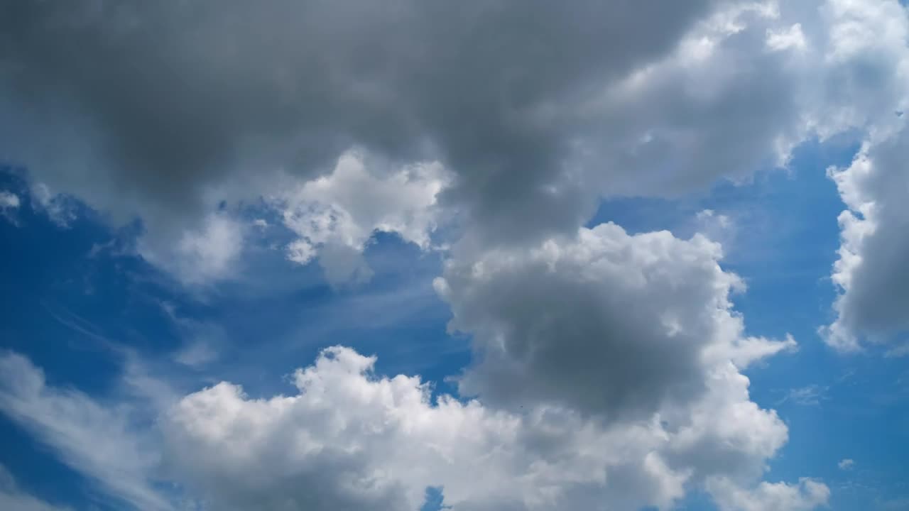 Clouds changing shapes smoothly in the sky