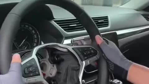 The mechanic removes the steering wheel and replaces it