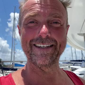 SV Imagine varnishing the teak