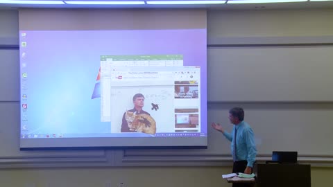 Math Professor Repairs Projector Screen as an April Fools’ Prank.