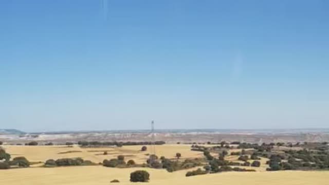 Outside view from a moving train to madrid