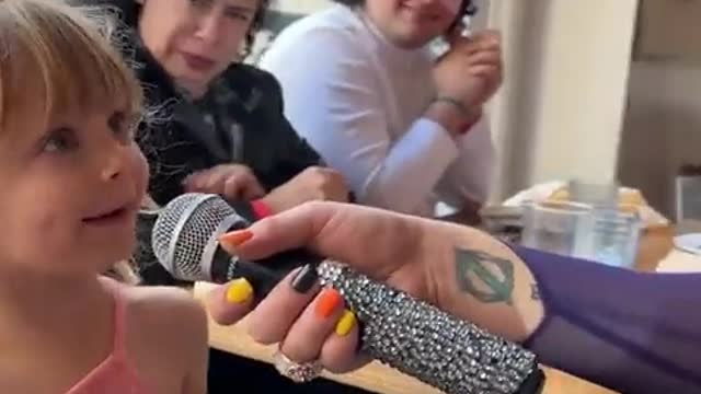 Drag queen offers a three year old “a shot” before taking money and “performing” for her.