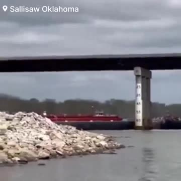 Large barge crashed into the Arkansas River bridge