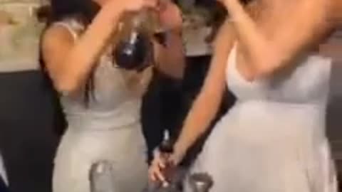 Let's watch how 2 girls drinking wine