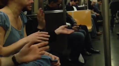 Pt. 2 strangers sing lean on me on subway