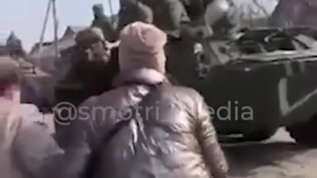 Liberated villagers in Eastern Ukraine meet the Russian Army