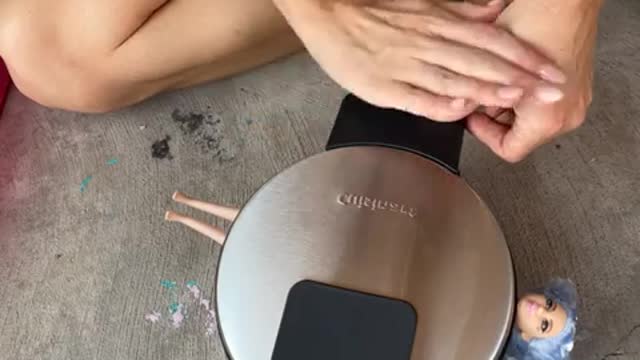 Look what it did to the DOLL!