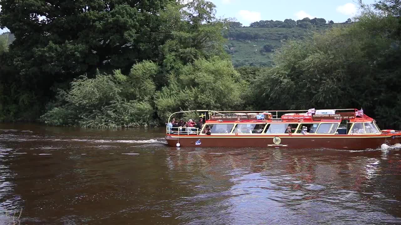Red Ferry Boat with Passengers