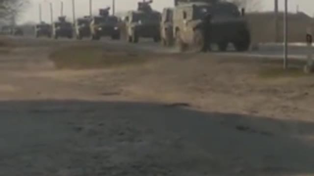 Brave Ukrainian Citizen Tries To Block Russian Convoy with His Body.