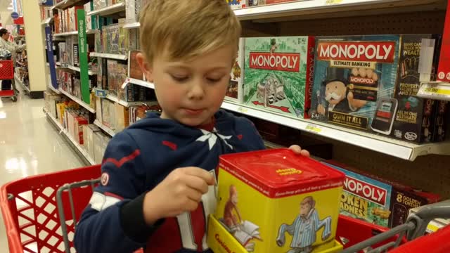 Boy's joy shows through in waiting for weasel (monkey)