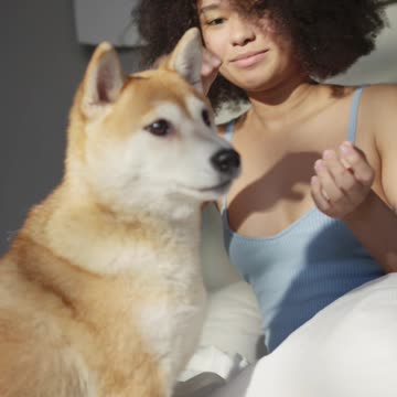 very nice dog and with dog there is a very cute girl