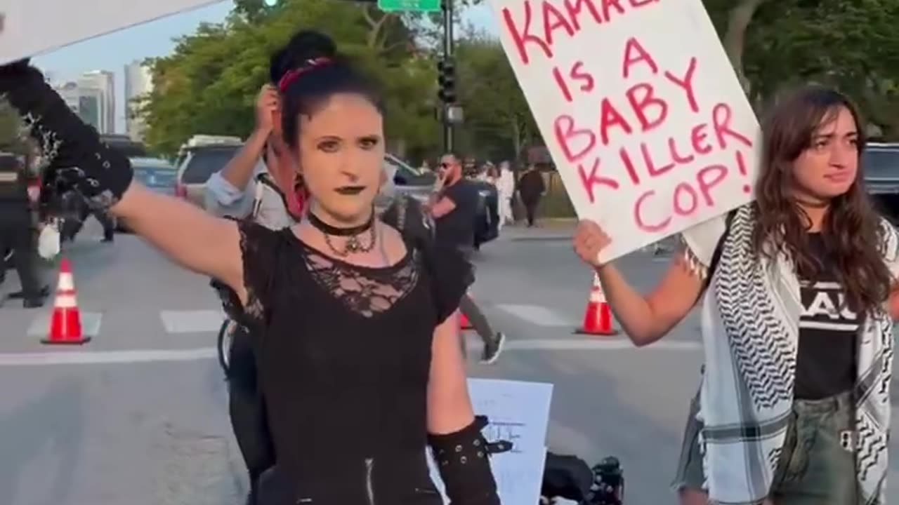 Queer pro-life protesters outside of the DNC: "Kamala is a baby killer cop!"