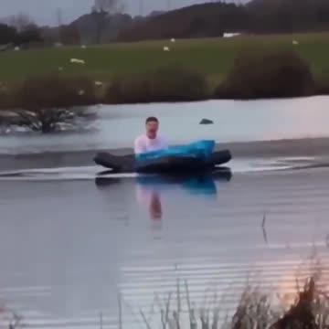 Guy on bed in lake vine