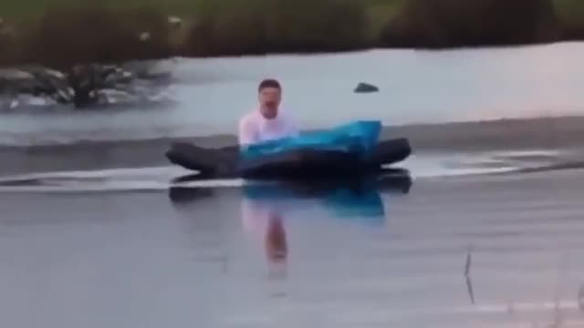 Guy on bed in lake vine