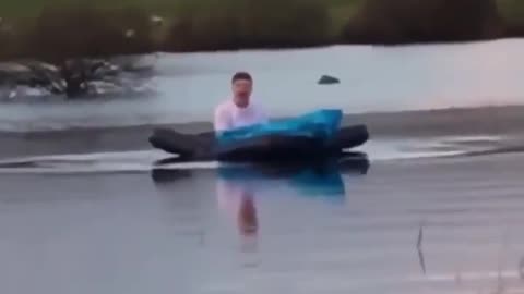 Guy on bed in lake vine