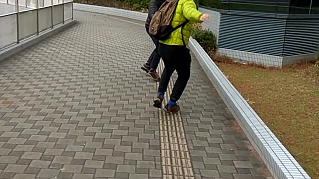 2 GROWN MEN FIGHTING WITH STICKS IN JAPAN